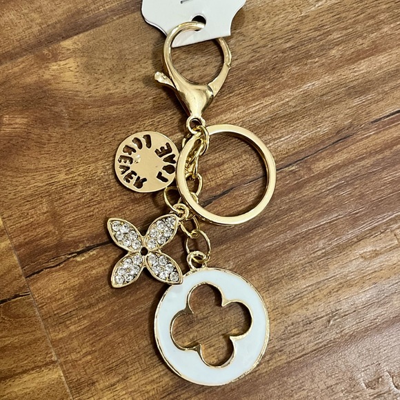 Accessories - NWT Clover Bag Charm white silver & gold